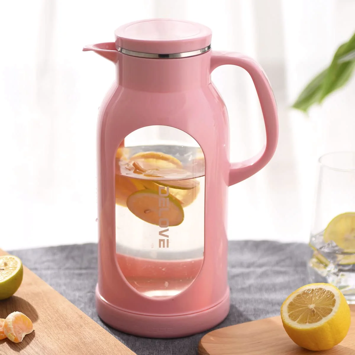 The 68 oz Delove pitcher with lemon and fruit, ready for the table.