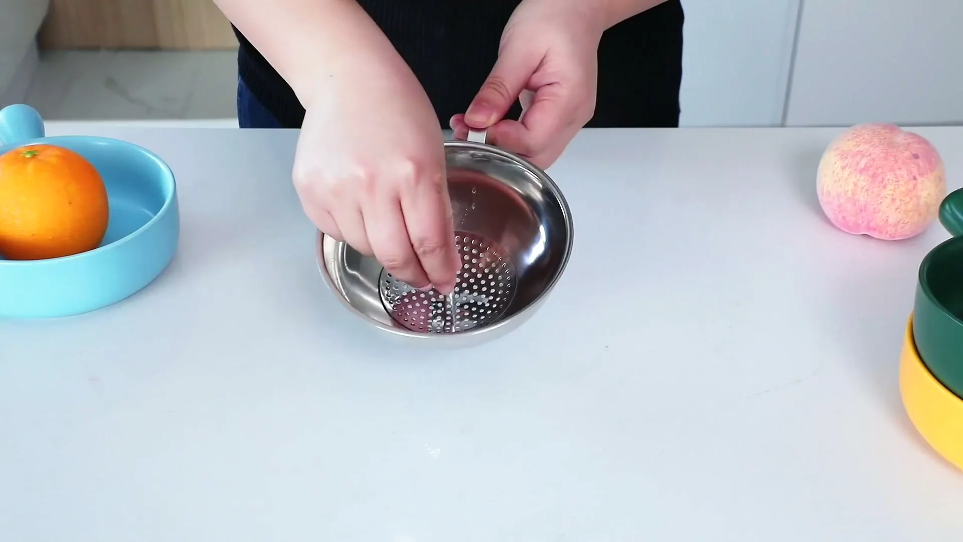 The Delove stainless set laid out: the large funnel, the small funnel and the umbrella strainer.